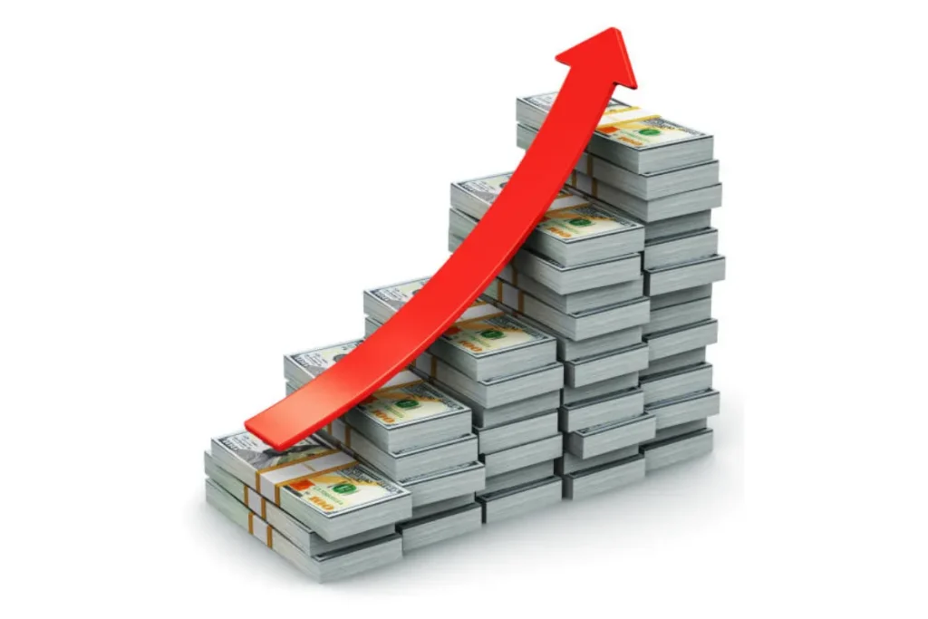 A stack of cash with an arrow pointing upwards, symbolizing growth in capital gains.