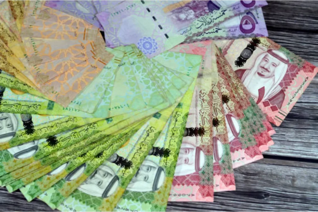 Newly designed Saudi riyal banknotes from Series 6, showcasing advanced security features and designs reflecting the Kingdom's Vision 2030 initiatives.