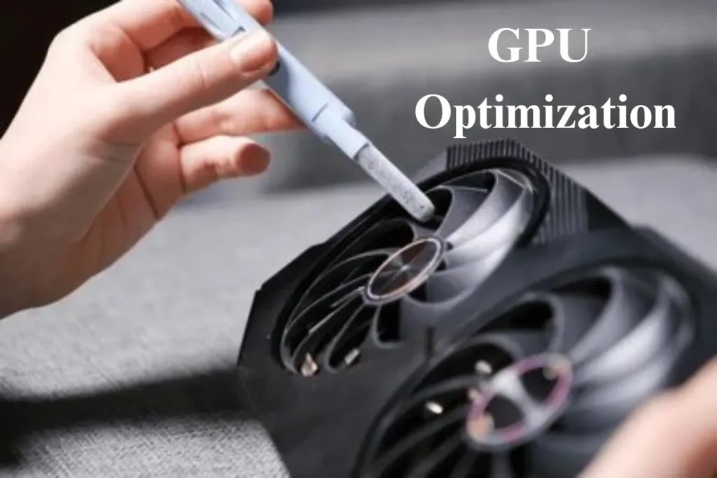 A person cleaning the fan of a GPU, representing the optimization process to improve GPU performance and longevity.